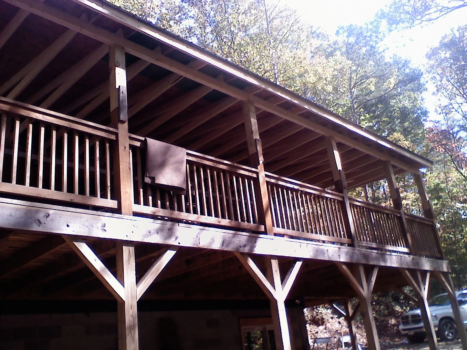 Timber framing under a new elevated porch and deck — Roof Leak Repair in Harris by Roofing Brothers